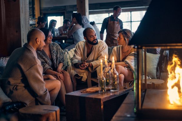 Photo of Nordik Spa-Nature Chelsea - Old Chelsea, QC, CA. A group of guests enjoying some social time at our lounge.