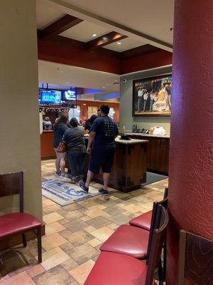 Photo of The Plaza Restaurant - Lubbock, TX, US. people waiting at the counter