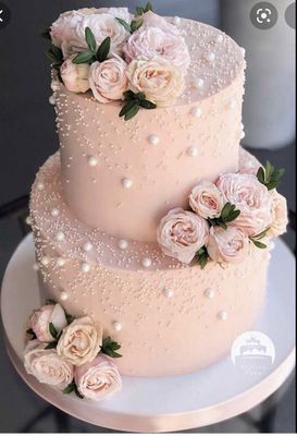 Photo of El Molino Real Bakery - Lawndale, CA, US. a pink wedding cake