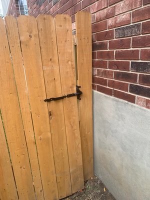 Photo of South Texas Fence - San Antonio, TX, US. a close up of a wooden gate