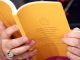 A copy of the apostolic exhortation 'Evangelii Gaudium' ('The Joy of the Gospel') by Pope Francis is seen during a news conference at the Vatican Nov. 26. (CNS photo/Alessandro Bianchi