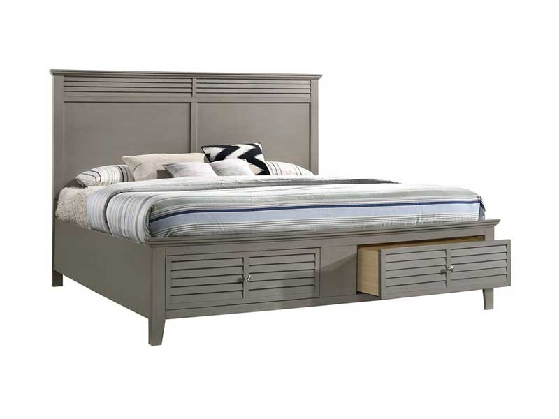 A gray wooden bed with headboard and storage drawers underneath.