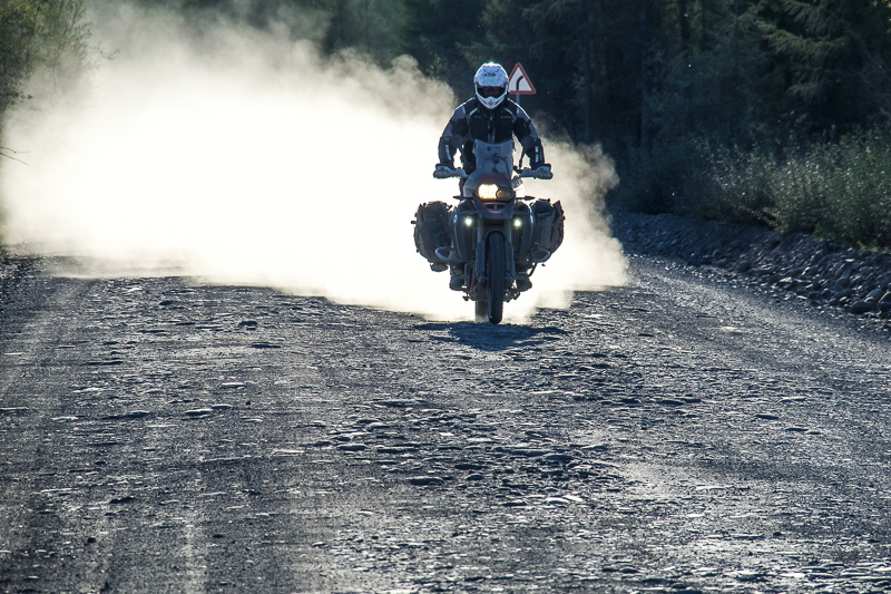 how to tune Motorcycle Suspension motorcycle and rider on dirt road