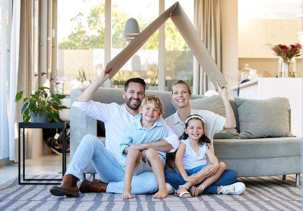 Our house is our safe space. Shot of a young family relaxing together at home.