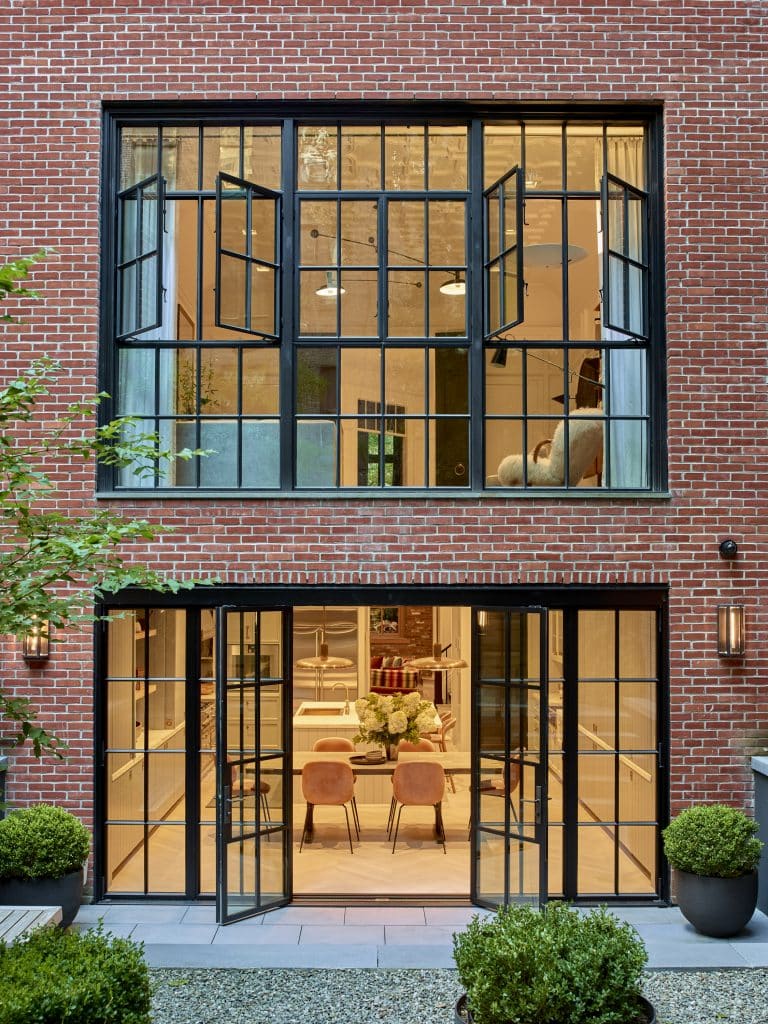 Interior Brad Ford West Village townhouse renovation brick exterior casement windows Ike Kligerman Barkley architects kitchen dining room living room