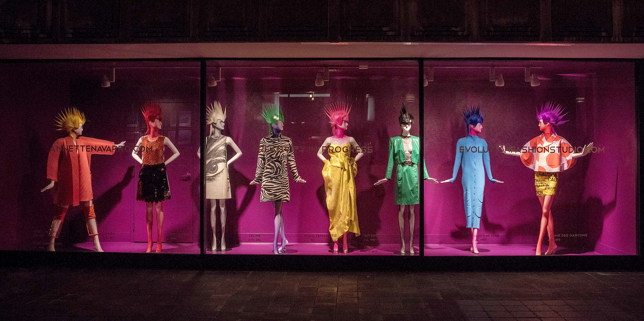 Looks by PRADA, CELINE, GIVENCHY, ISSEY MIYAKE and others in an Evolution window display at the Gidding-Jenny building, in downtown Cincinnati.