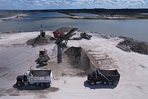 conveyors and construction trucks on site working