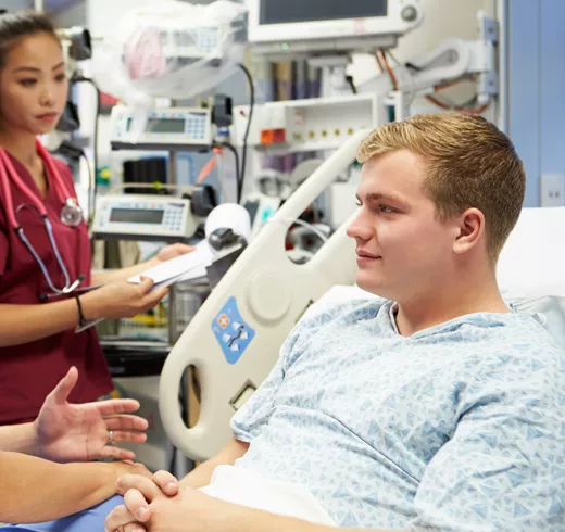 Nurse is attending to a patient