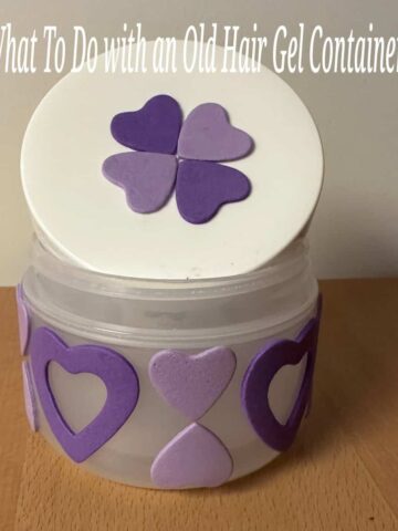 the finished container with hearts on it and a title of this article