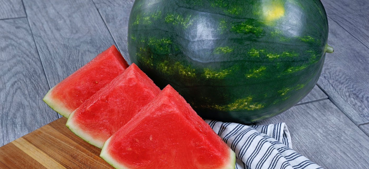 Whole watermelon and watermelon slices