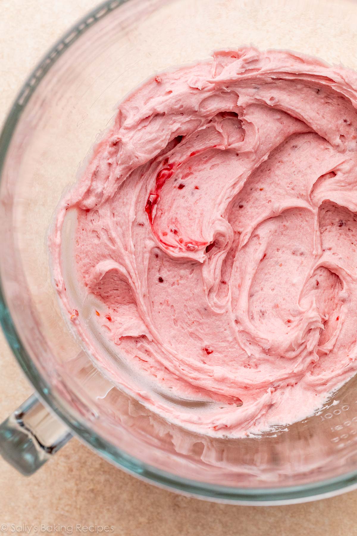 raspberry jam buttercream in glass bowl.