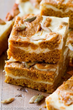 stack of pumpkin cream cheese swirl bars