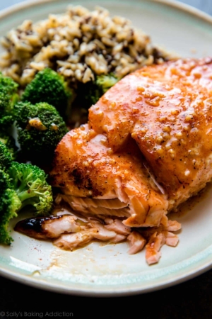 honey chipotle salmon on a plate with broccoli and rice