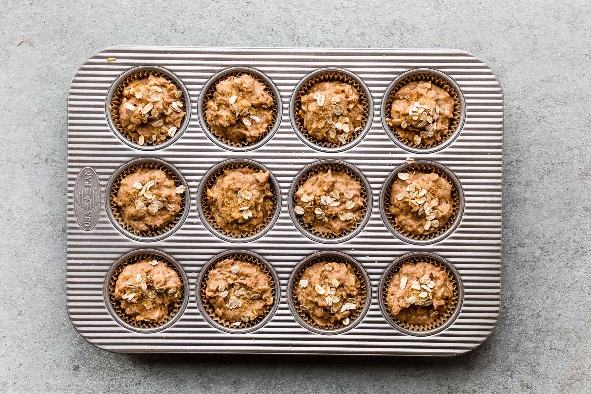 whole wheat banana muffins batter in muffin pan