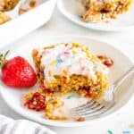 Strawberry pop tart baked oats served on a white plate.