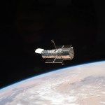 Photograph of Hubble orbiting the Earth