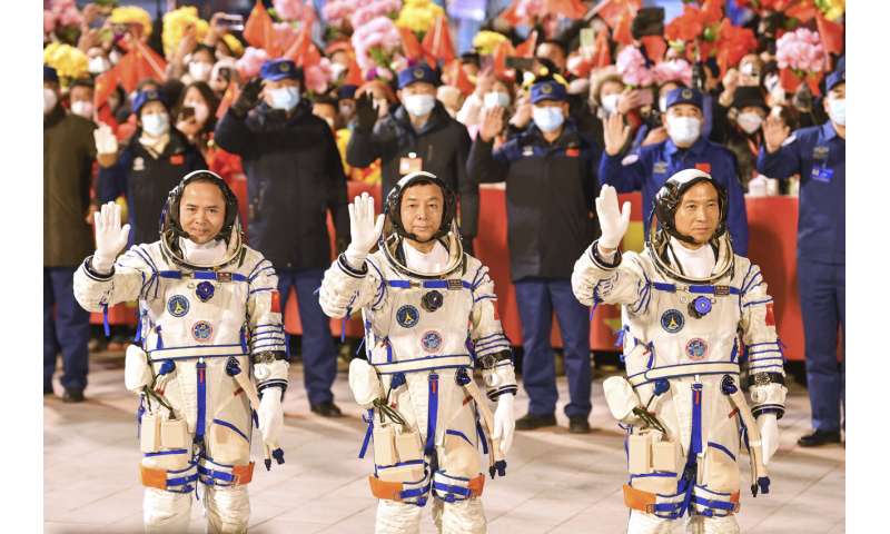 Chinese spaceship with 3 aboard docks with space station