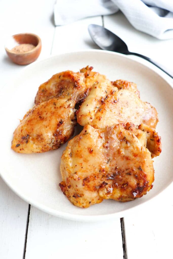 finished ninja foodi chicken thighs in a bowl