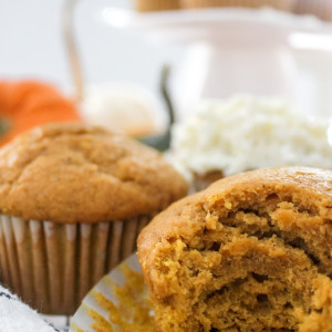 half bitten moist pumpkin spice muffin close up