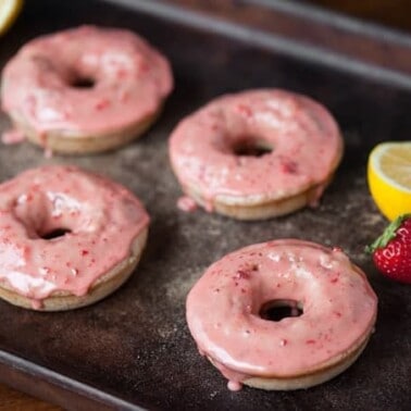 These easy to make Baked Strawberry Lemonade Donuts made from freeze dried strawberries and fresh Meyer lemons are the perfect summer breakfast treat!