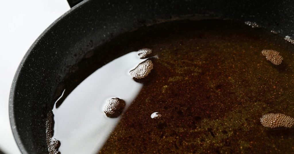 Used cooking oil in a pan.