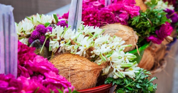 coconut and flower offering for holi in India, story on vegan leather from waste