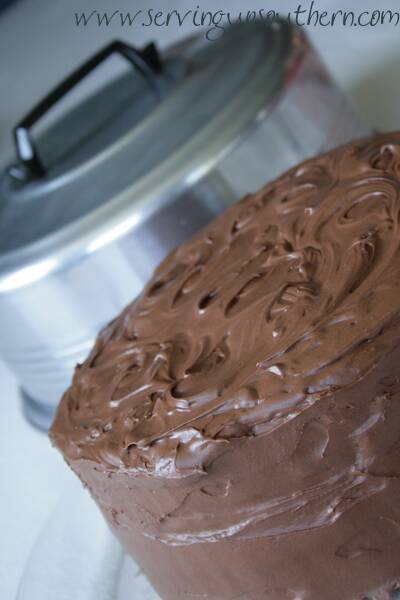 A chocolate buttermilk cake on a cake platter