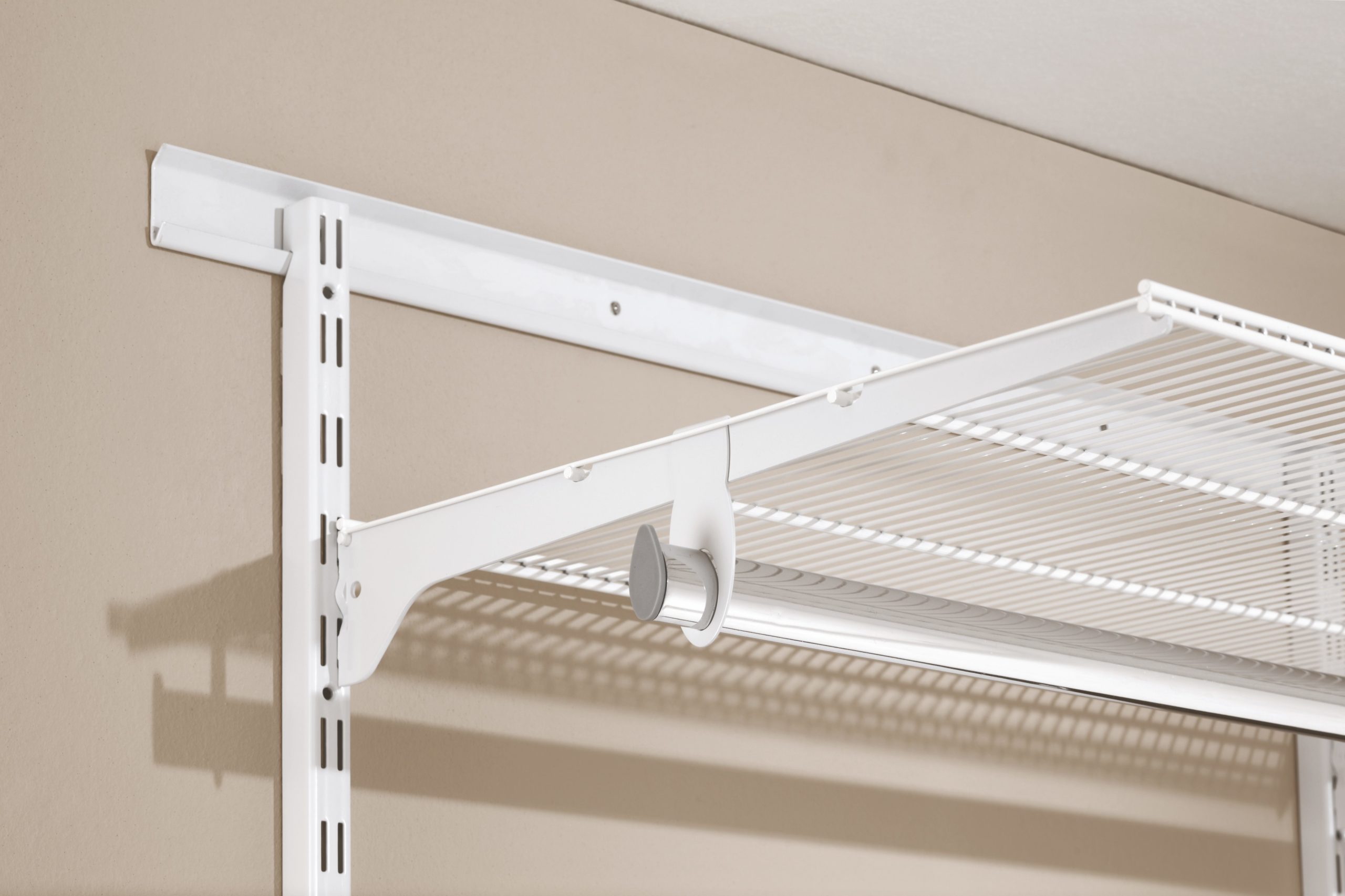 Walk-in-gridboard-bracket-and-shelf-featuring-hang-brackets-scaled