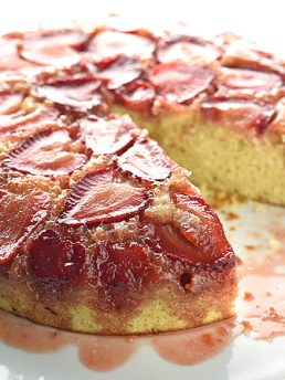 strawberry upside down cake with one slice cut oout