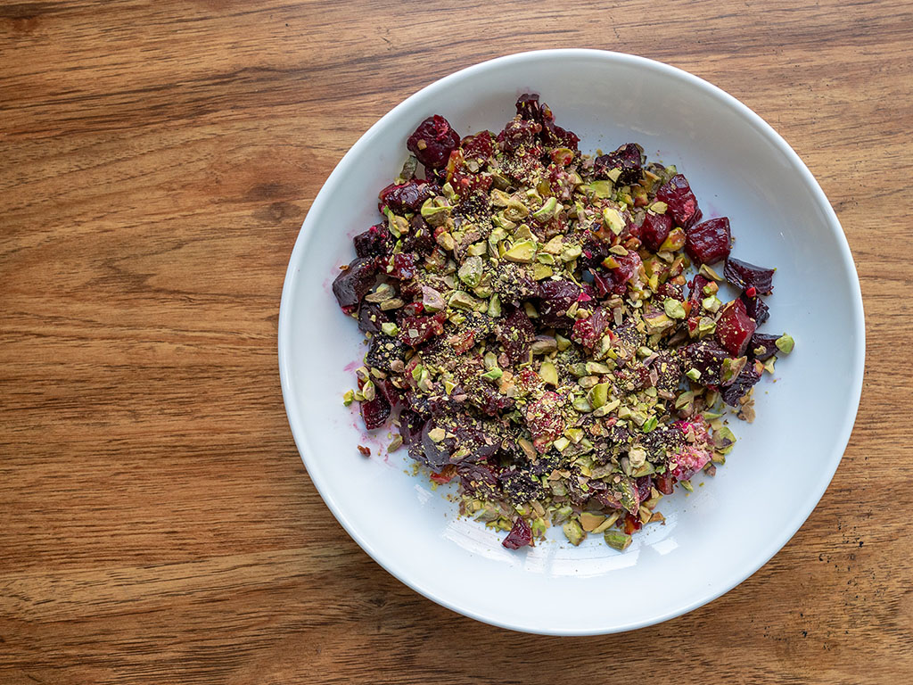 Roasted beets with crushed pistachios and goat cheese