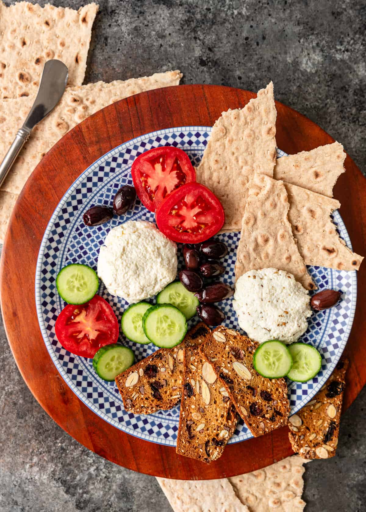 overhead: a platter of Lebanese white cheese, crackers, tomatoes, cucumbers, and olives