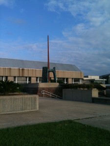 A Red Stick statue along the river - we're in Baton Rouge!