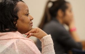 social work student listening to lecture