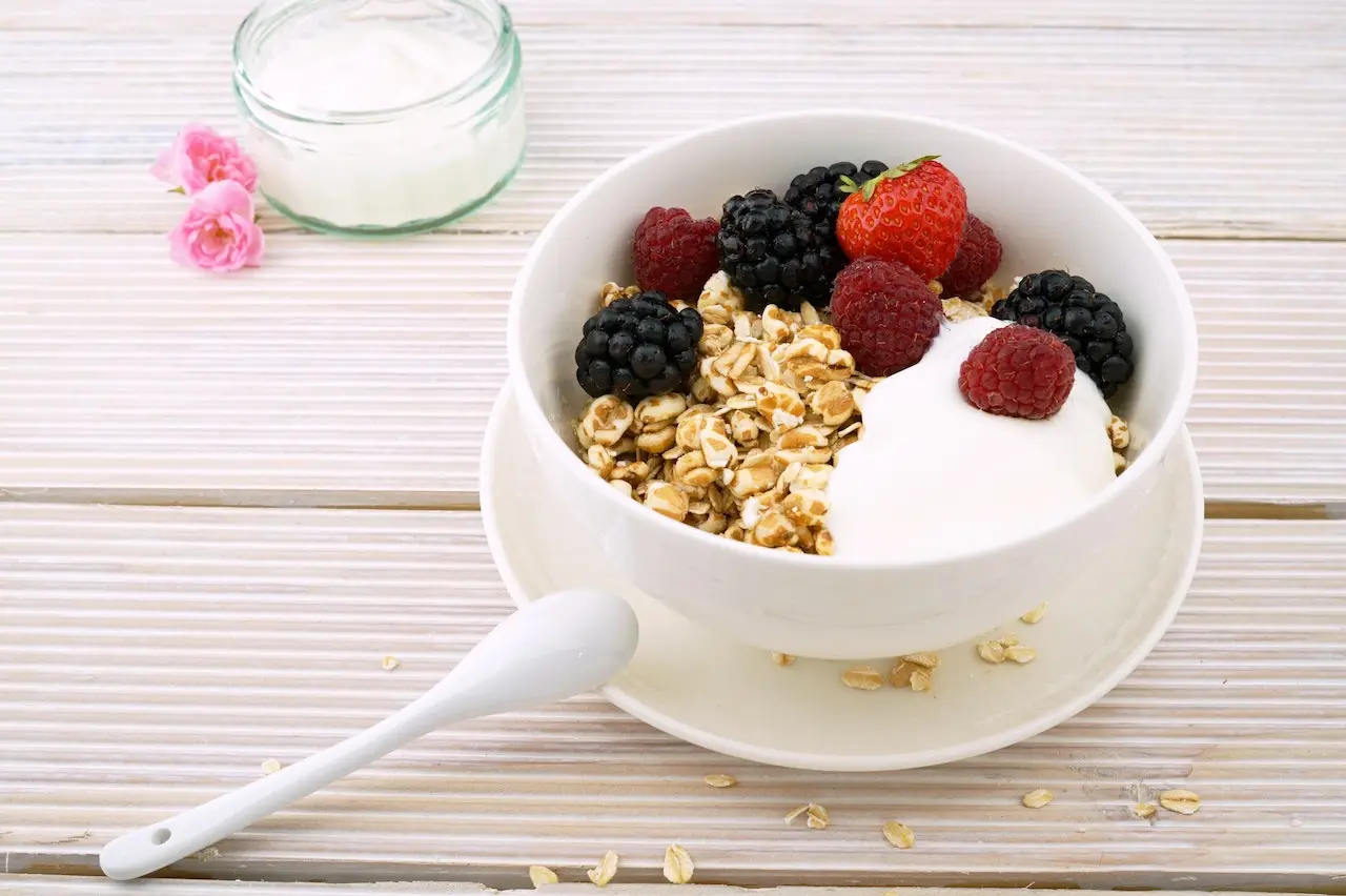 Red Strawberry and Raspberry on Yogurt Bowl