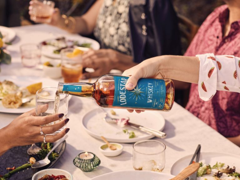 Lodestar Whiskey being served at a table