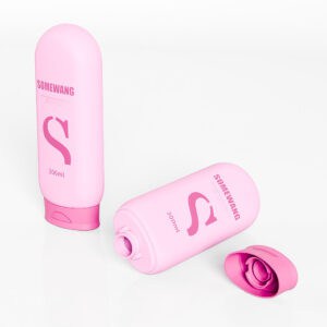 Abgebildet sind zwei rosa 300-ml-HDPE-Flaschen; eine aufrecht stehend und die andere ohne Deckel daneben liegend, beide mit dem Text „SOMEWANG“.