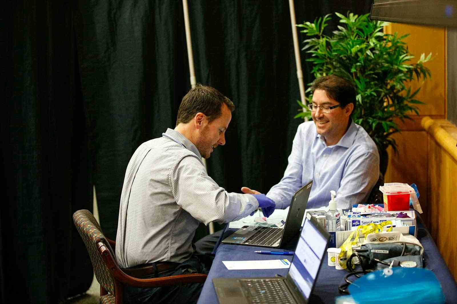 Nurse and patient at biometric screening