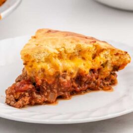 close up shot of a slice of Sloppy Joe Pie on a plate