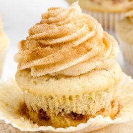 a close up shot of a Cinnamon Cupcake on a plate