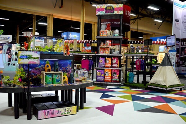 Pet supplies setup on a group of displays in a store