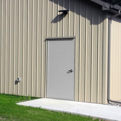 A metal building with a FRP door.