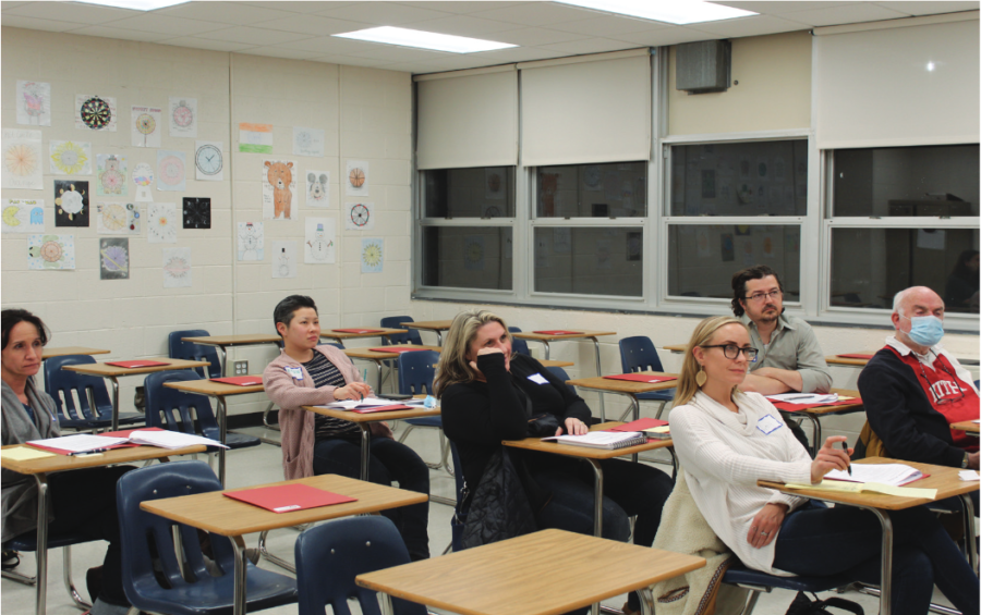 Deep discussion: Members of the Change Committee sit in a circle and talk about the team’s goals following a brief introduction. All action teams met for the first time in Conestoga on March 15. Over the next few weeks, teams will plan initiatives designed to improve district operations with respect to their designated areas of focus.