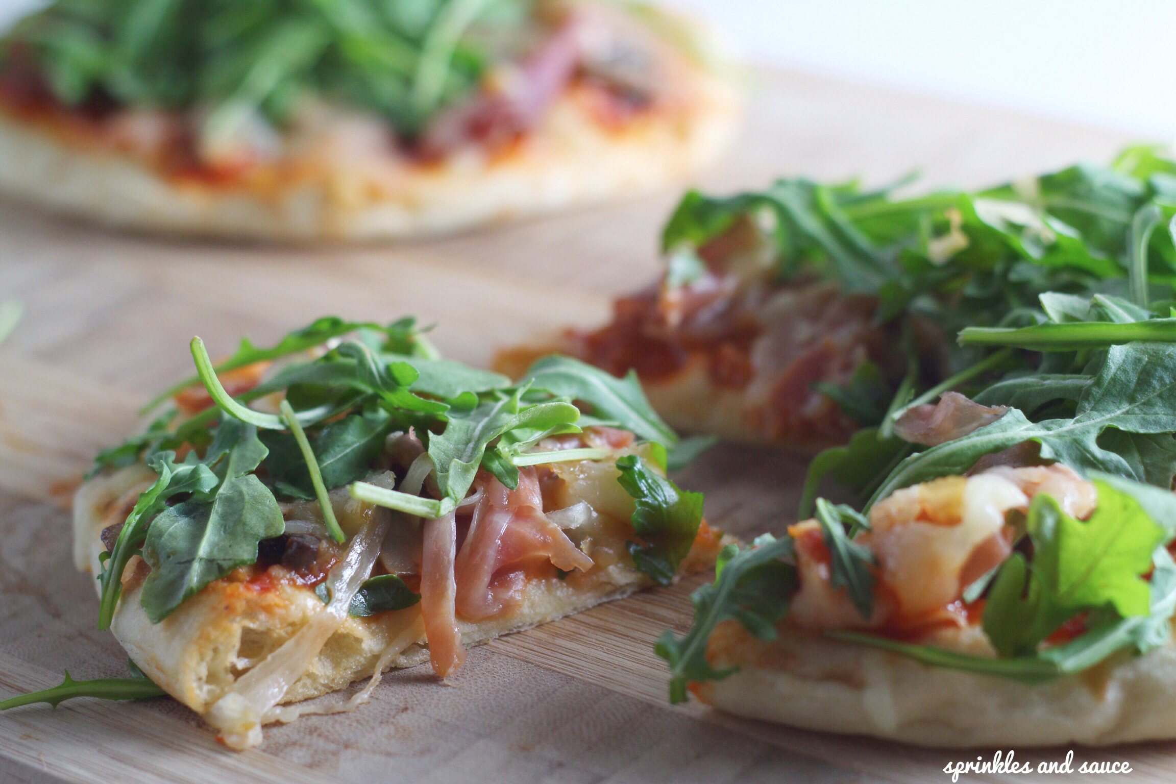 Pita Pizza with Prosciutto, Mushrooms and Arugula