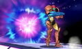 Samus standing in front of a Dense Charge Shot blast.