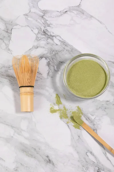 matcha green tea powder powder in a white bowl