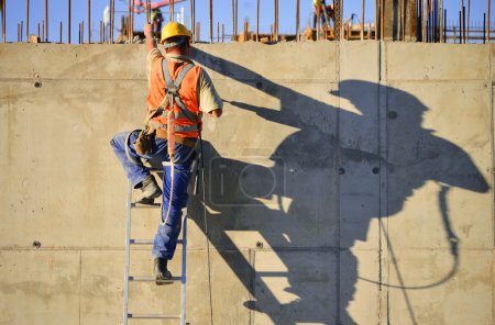 Foto de Trabajadores de la construcción en el trabajo - Imagen libre de derechos