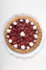 Top view of cherry Flan with cream rosettes — Stock Photo