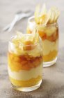 Layered dessert in glasses — Stock Photo