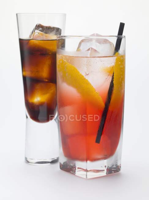 Campari Soda and a glass of bitter schnapps — Stock Photo