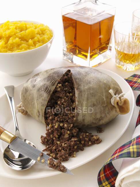 A whole traditional Burns Night haggisspilt open — Stock Photo